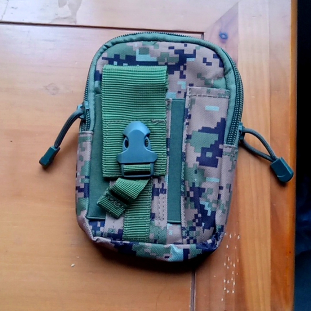 Military pouch, roughly ~ (7 1/4 in. Length), (5 in. Wide)